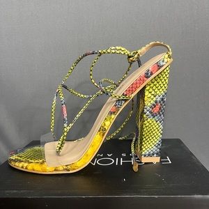 Brand new multicolor snakeskin sexy heels.